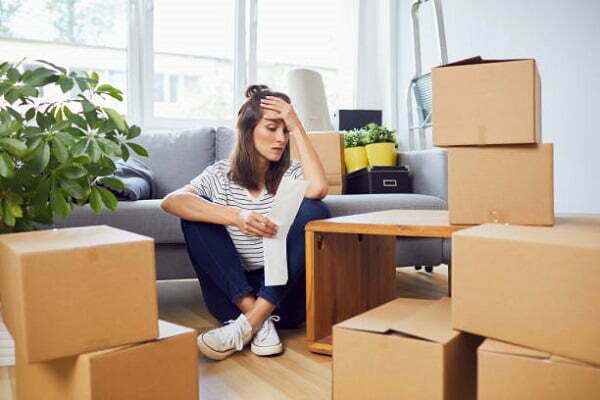 I’m behind on my mortgage. Should I move out or stay in the house?